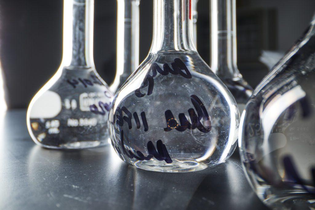 Solvents in beakers - one of the green chemistry principles